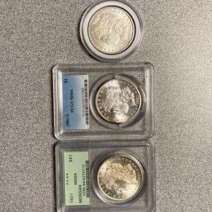 Three Morgen dollars for sale. 1921, 1881, and 1895